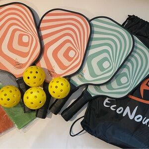 EcoNour Pickleball Paddle Set with 4 paddles and 4 Balls.  Brand new!
